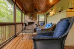 Main Level Screened In Porch with Wood Fireplace